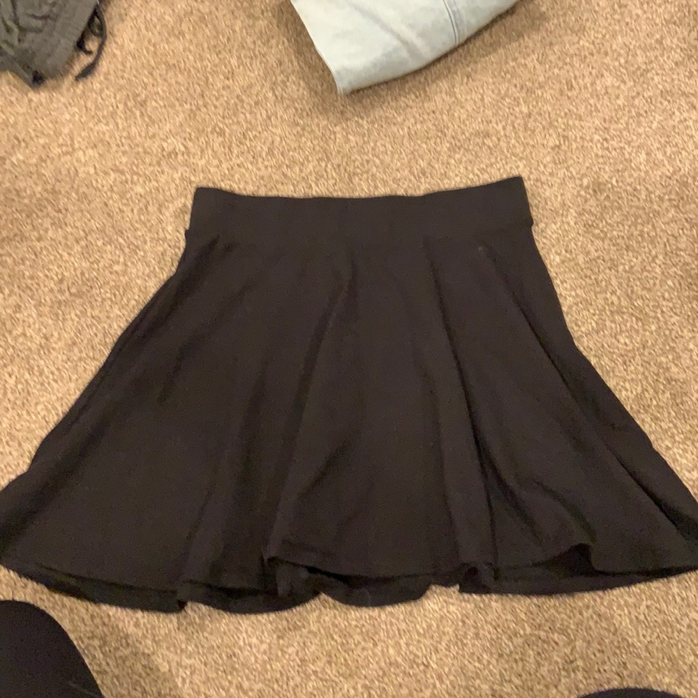 Skater girl black skirt